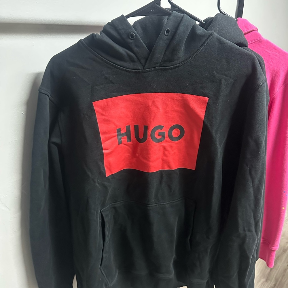 HUGO Black Hoodie with Vibrant Red Accent